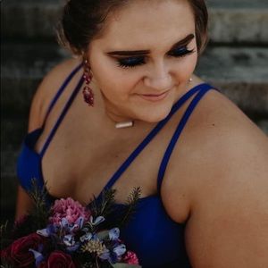 Size 18 prom dress taken in as 14 can be loosened